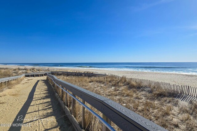 property view of water with a beach view