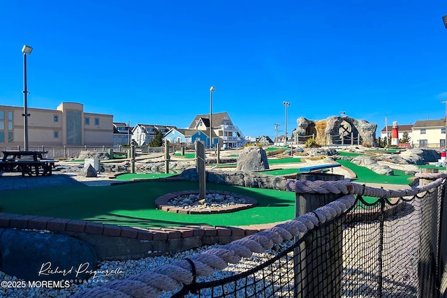 surrounding community featuring fence