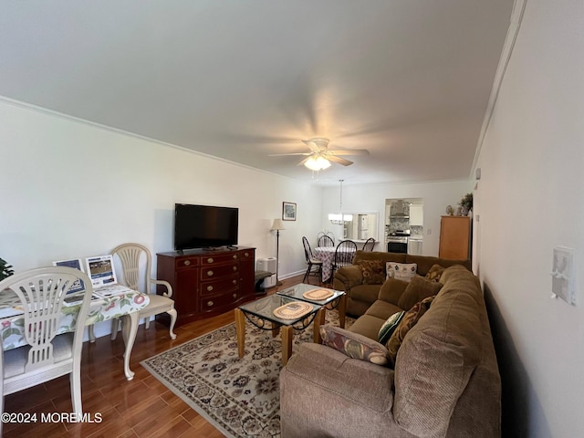 living room featuring wood finished floors and ceiling fan