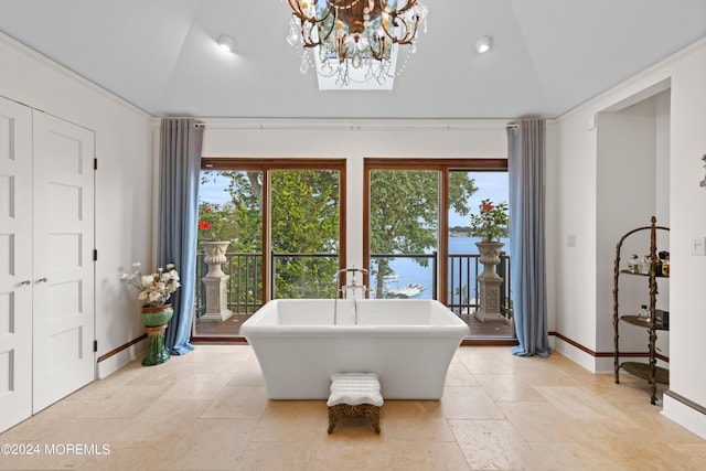 bathroom with high vaulted ceiling, a chandelier, a soaking tub, baseboards, and recessed lighting