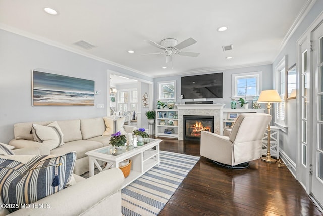 living room featuring visible vents, recessed lighting, wood finished floors, ceiling fan, and crown molding