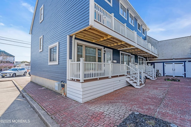 view of property with a balcony