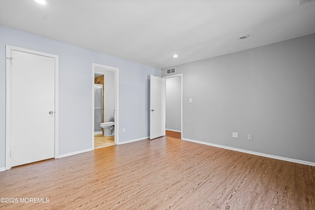 unfurnished bedroom with light wood-type flooring, baseboards, visible vents, and recessed lighting
