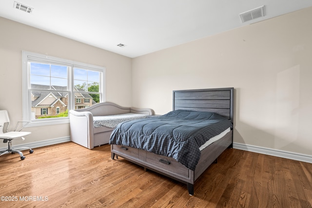 4 Friendship Ln, West Long Branch, NJ 07764 - bedroom featuring wood finished floors and baseboards