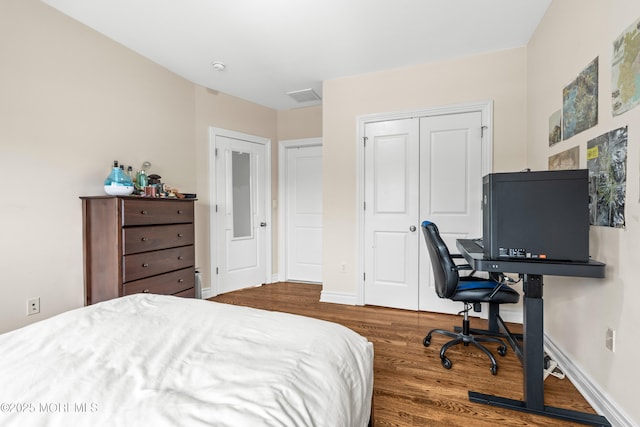 4 Friendship Ln, West Long Branch, NJ 07764 - bedroom with wood finished floors, baseboards, and an office area
