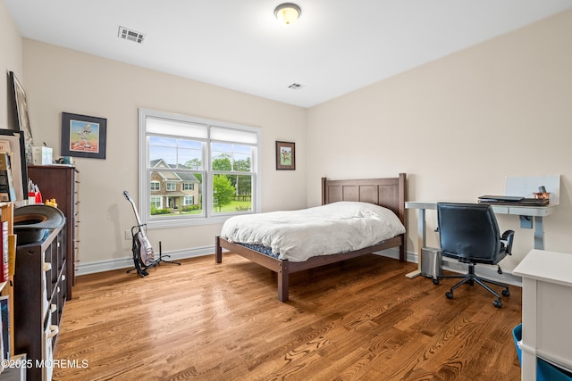 4 Friendship Ln, West Long Branch, NJ 07764 - bedroom with wood finished floors and baseboards