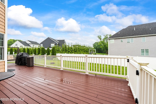4 Friendship Ln, West Long Branch, NJ 07764 - wooden deck with grilling area and a residential view