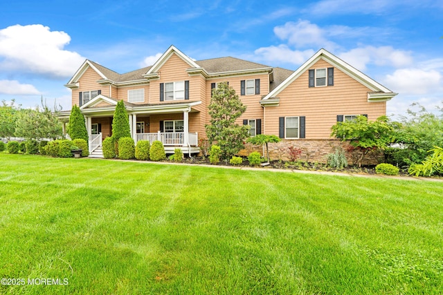 4 Friendship Ln, West Long Branch, NJ 07764 - view of front facade with a porch, a front yard, and stone siding