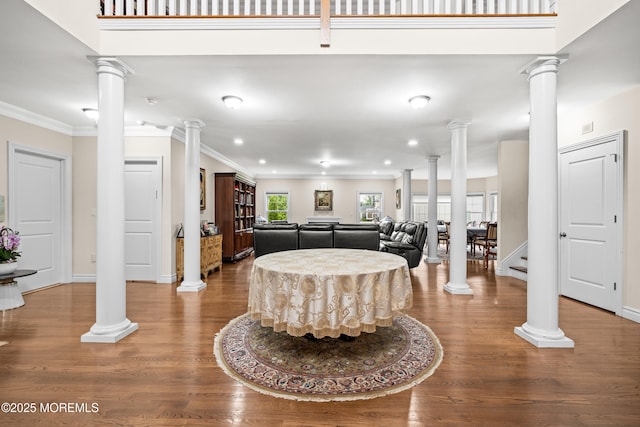 4 Friendship Ln, West Long Branch, NJ 07764 - living area with ornate columns, wood finished floors, baseboards, crown molding, and recessed lighting