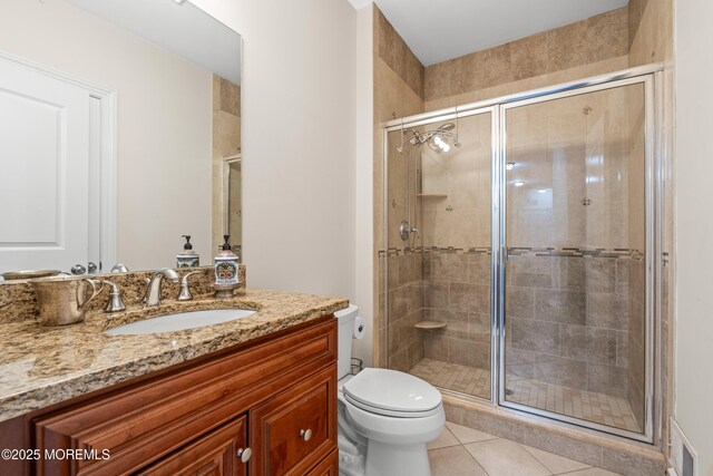 4 Friendship Ln, West Long Branch, NJ 07764 - bathroom with vanity, a stall shower, toilet, and tile patterned floors