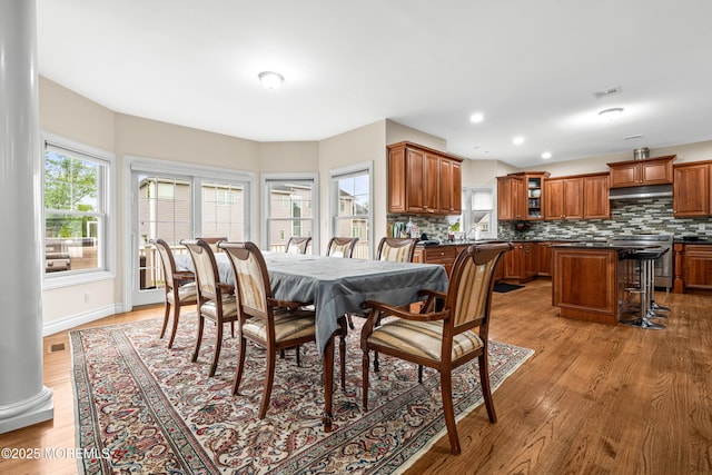 4 Friendship Ln, West Long Branch, NJ 07764 - dining room featuring light wood-style floors and baseboards
