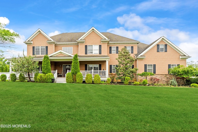 4 Friendship Ln, West Long Branch, NJ 07764 - view of front facade with a front yard, a shingled roof, and covered porch