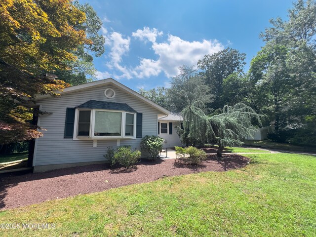 785 Bennetts Mills Rd, Jackson, NJ 08527 - view of front of house with a front yard and a patio