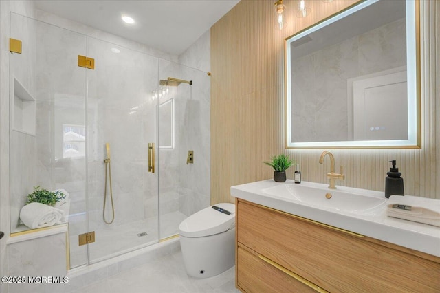 full bathroom featuring toilet, a stall shower, and vanity