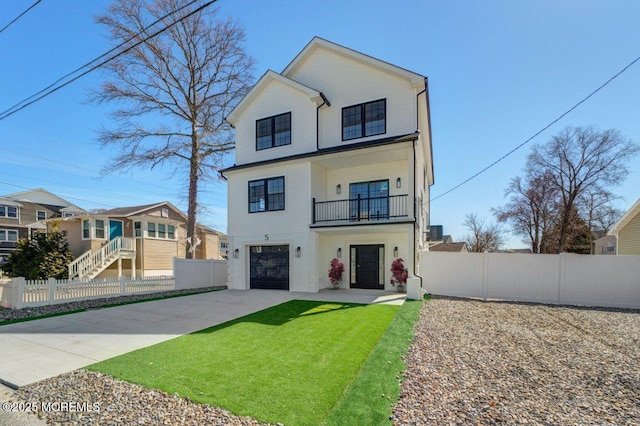 view of front of property featuring a balcony, a garage, fence, and concrete driveway