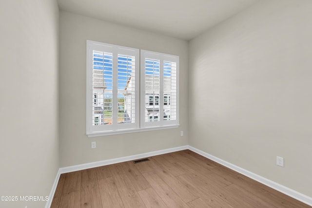 75 Driftwood Cir, Oceanport, NJ 07757 - spare room featuring baseboards, visible vents, and wood finished floors