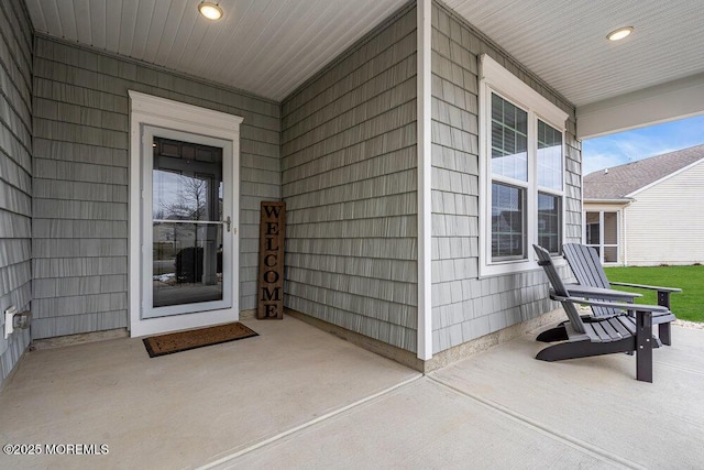 entrance to property with a porch