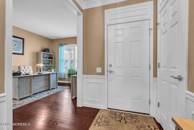 foyer with wainscoting and dark wood finished floors