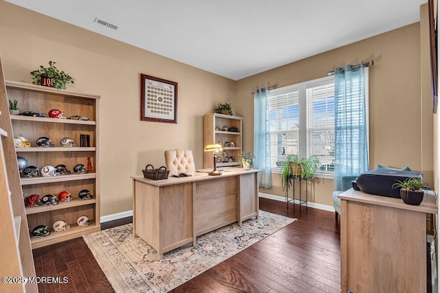 office with baseboards, visible vents, and dark wood-style flooring