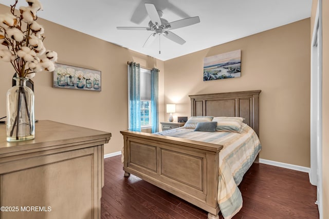 bedroom featuring baseboards, dark wood-style floors, and ceiling fan