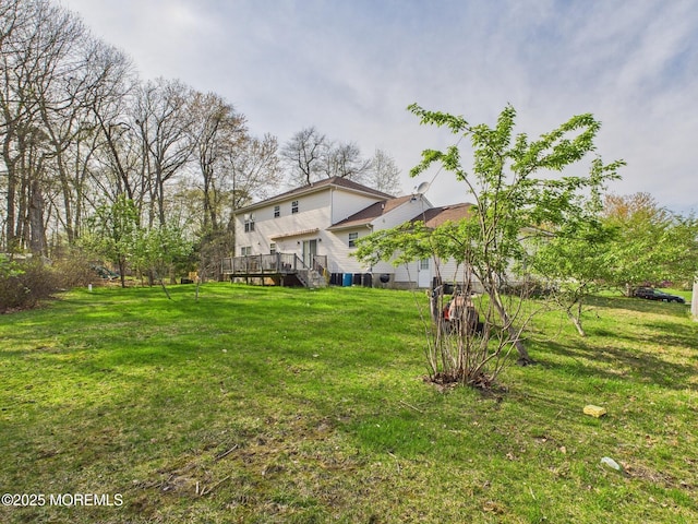 view of yard with a deck