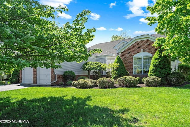 1505 Wishing Well Ln, Manasquan, NJ 08736 - view of front of property with brick siding, a front lawn, and a garage