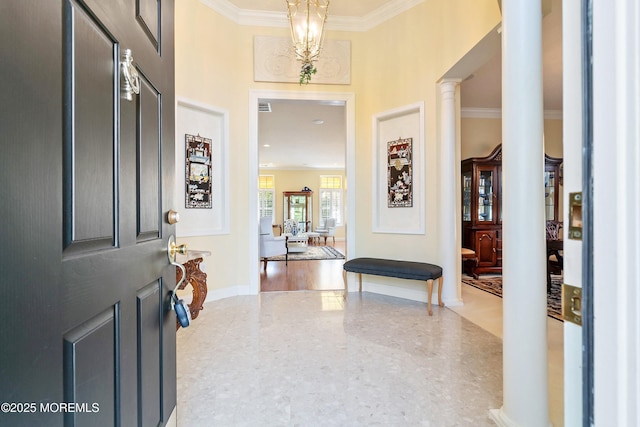 1505 Wishing Well Ln, Manasquan, NJ 08736 - entrance foyer featuring crown molding, decorative columns, and baseboards