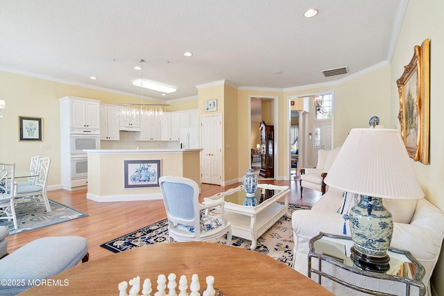 1505 Wishing Well Ln, Manasquan, NJ 08736 - living room with ornamental molding, light wood-style floors, recessed lighting, and baseboards