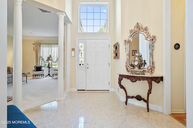 1505 Wishing Well Ln, Manasquan, NJ 08736 - foyer entrance with ornate columns, baseboards, and crown molding