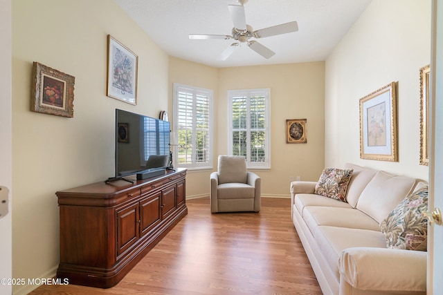 1505 Wishing Well Ln, Manasquan, NJ 08736 - living area with light wood-style floors, ceiling fan, and baseboards