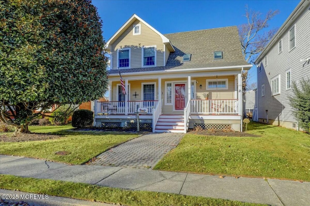 view of front of house featuring a front lawn and a porch