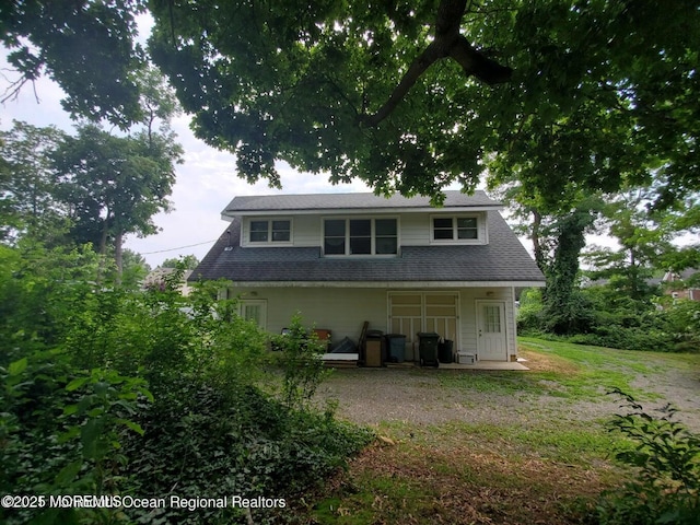 92 Compton St, Belford, NJ 07718 - view of front of house with a front lawn