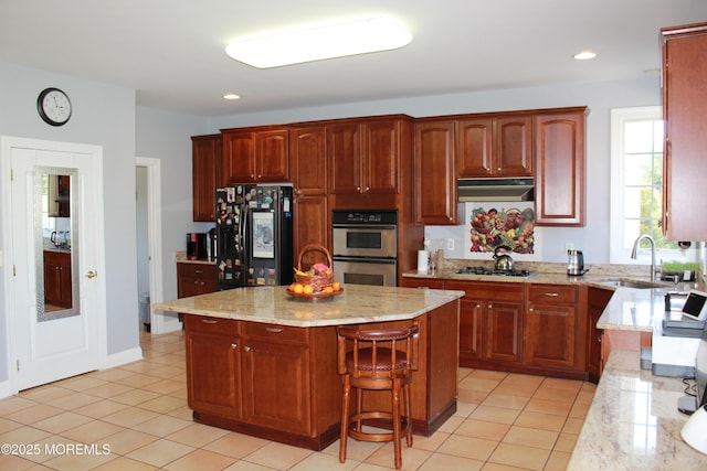 2 Lecarre Dr, Marlboro, NJ 07746 - kitchen featuring a sink, black refrigerator, stainless steel double oven, gas stovetop, and under cabinet range hood