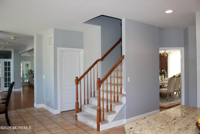 2 Lecarre Dr, Marlboro, NJ 07746 - stairway featuring a chandelier, tile patterned flooring, baseboards, visible vents, and recessed lighting