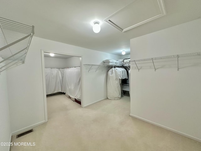 2 Lecarre Dr, Marlboro, NJ 07746 - walk in closet with visible vents and light colored carpet
