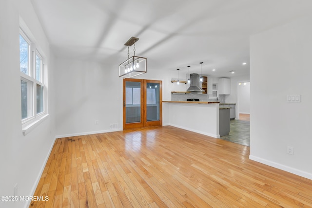 115 Leesville Rd, Jackson, NJ 08527 - unfurnished living room with light wood-type flooring, baseboards, and recessed lighting