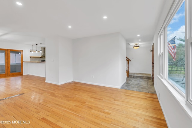 115 Leesville Rd, Jackson, NJ 08527 - unfurnished living room featuring light wood-style floors, recessed lighting, baseboards, and stairway