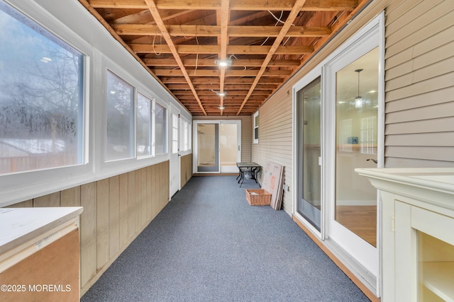 115 Leesville Rd, Jackson, NJ 08527 - unfurnished sunroom with wood walls and carpet floors