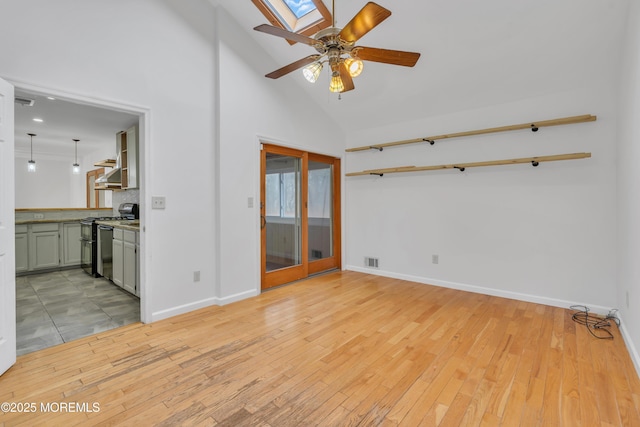 115 Leesville Rd, Jackson, NJ 08527 - spare room featuring baseboards, light wood-style flooring, visible vents, a skylight, and ceiling fan