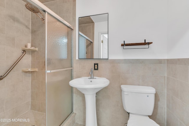 115 Leesville Rd, Jackson, NJ 08527 - bathroom featuring a shower stall, tile walls, and toilet