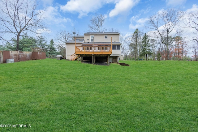 115 Leesville Rd, Jackson, NJ 08527 - back of property with a yard, fence, a deck, and stairway