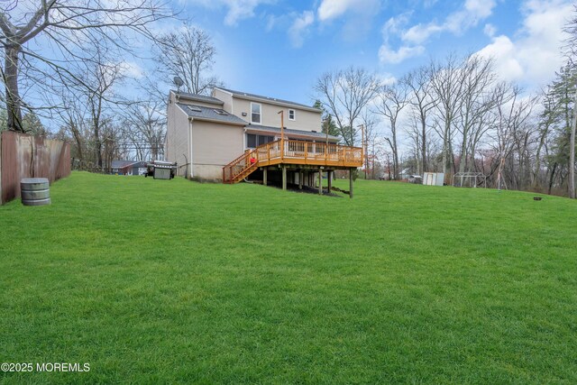 115 Leesville Rd, Jackson, NJ 08527 - back of house featuring stairway, a wooden deck, a lawn, and roof with shingles