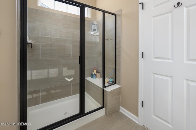 bathroom featuring a shower stall