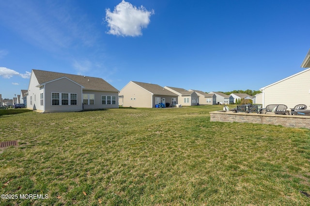 view of yard with a residential view
