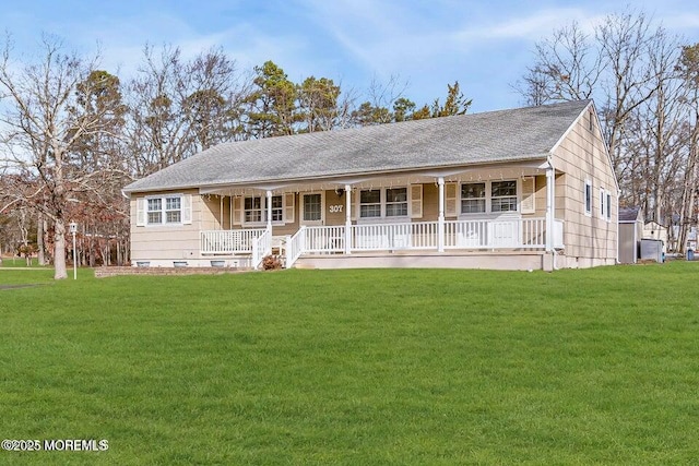 ranch-style house with a front lawn, crawl space, a shingled roof, and covered porch