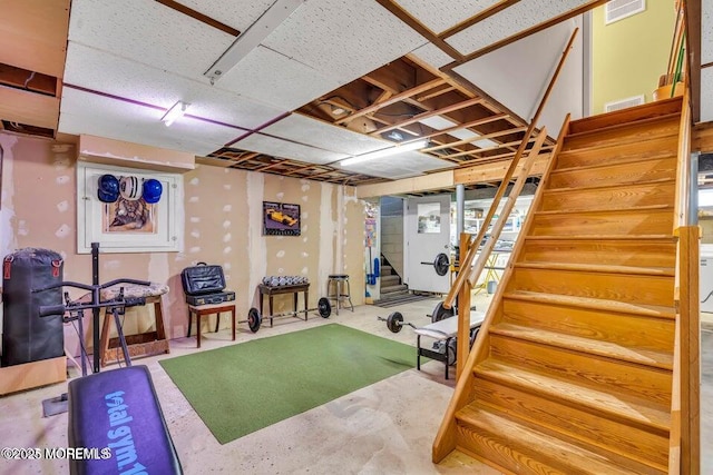 exercise room featuring visible vents