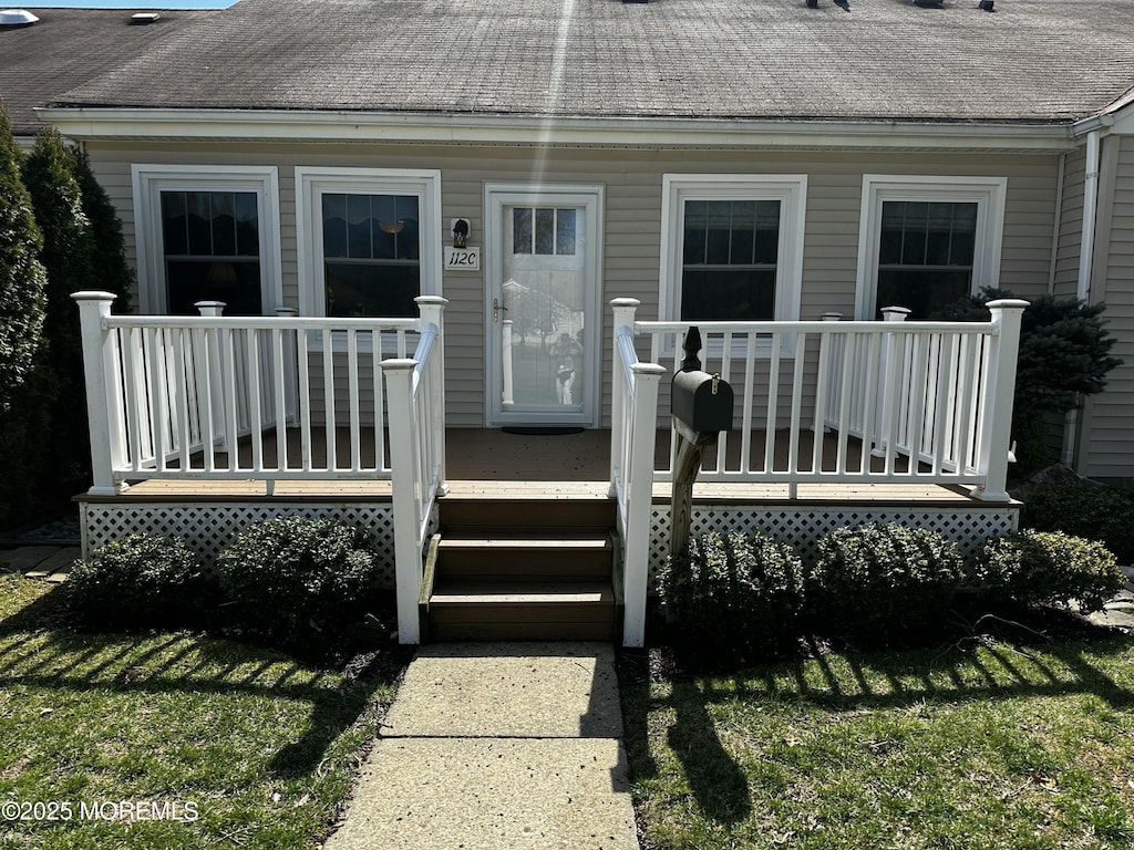 112 Pilatus Platz Unit C, Freehold, NJ 07728 - doorway to property with roof with shingles
