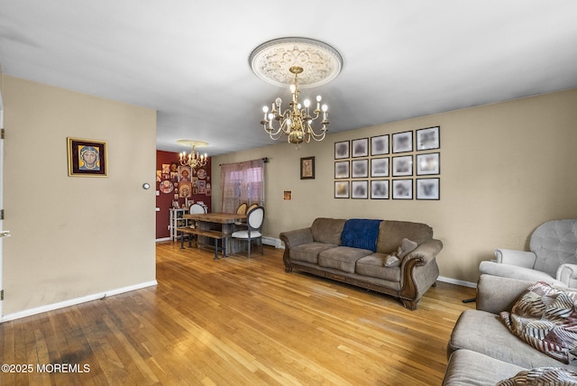 2776 John F Kennedy Blvd, Jersey City, NJ 07306 - living area featuring baseboards, light wood-style floors, a chandelier, and baseboard heating