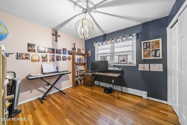 2776 John F Kennedy Blvd, Jersey City, NJ 07306 - office space with baseboards, wood finished floors, an inviting chandelier, and a baseboard heating unit