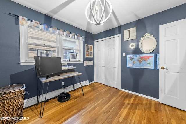 2776 John F Kennedy Blvd, Jersey City, NJ 07306 - office area featuring a baseboard radiator, baseboards, a chandelier, and wood finished floors